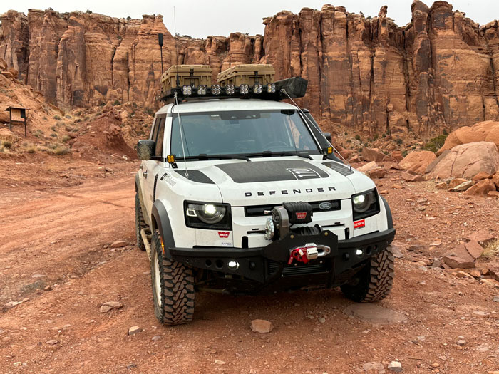 Land Rover Defender off-road in the mountains off-road