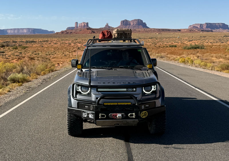 Land Rover Defender in Monument Valley Utah on the way to off-road trails.